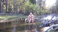 Jerking off in the river. Thumb