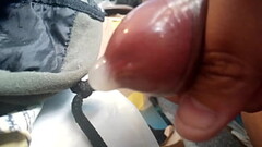 Jacking off my uncut cock, wearing a condom, cumming inside a condom. May 28, 2023. Thumb