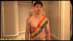 Sexy models getting painted on his pecs! Thumb