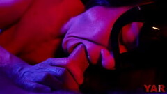 A masked woman sucks a big cock with an ending in her mouth a gentle blowjob in neon light to the music Thumb