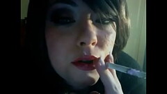 BBW Mistress Tina Snua Smokes A Cigarette In Glasses Thumb