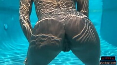 Ebony MILF model Ana Foxxx dips naked in a big pool and looks so hot Thumb